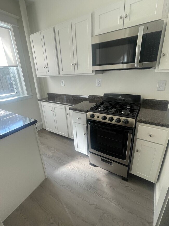 Building Photo - NO FEE Brand New Beautiful Split 2 bed with Stainless Kitchen, New Floors Sunny NICE ONE!  NO FEE