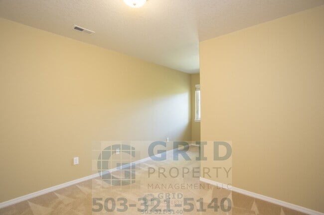 Building Photo - 1113 SE Alika Ave