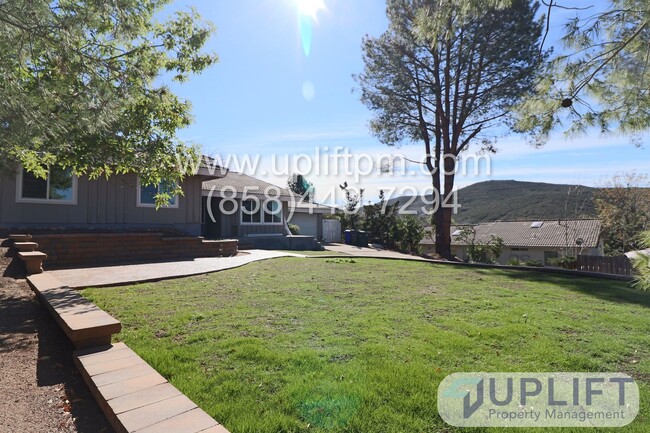 Building Photo - 4 Bedroom 2 Bath with Garage and Greenhous...