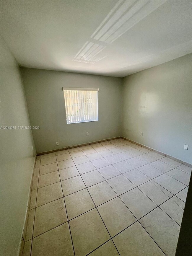 Building Photo - 6975 NW 173rd Dr