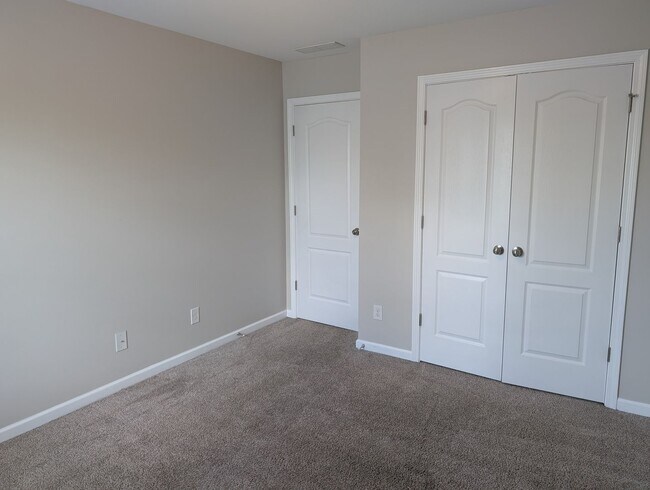Building Photo - Pristine, move in ready Home located in th...