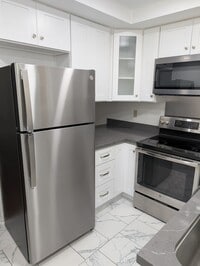 Building Photo - First-Level Townhome with Private Patio