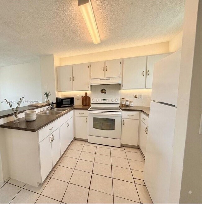 Building Photo - 8750 N Sherman Cir