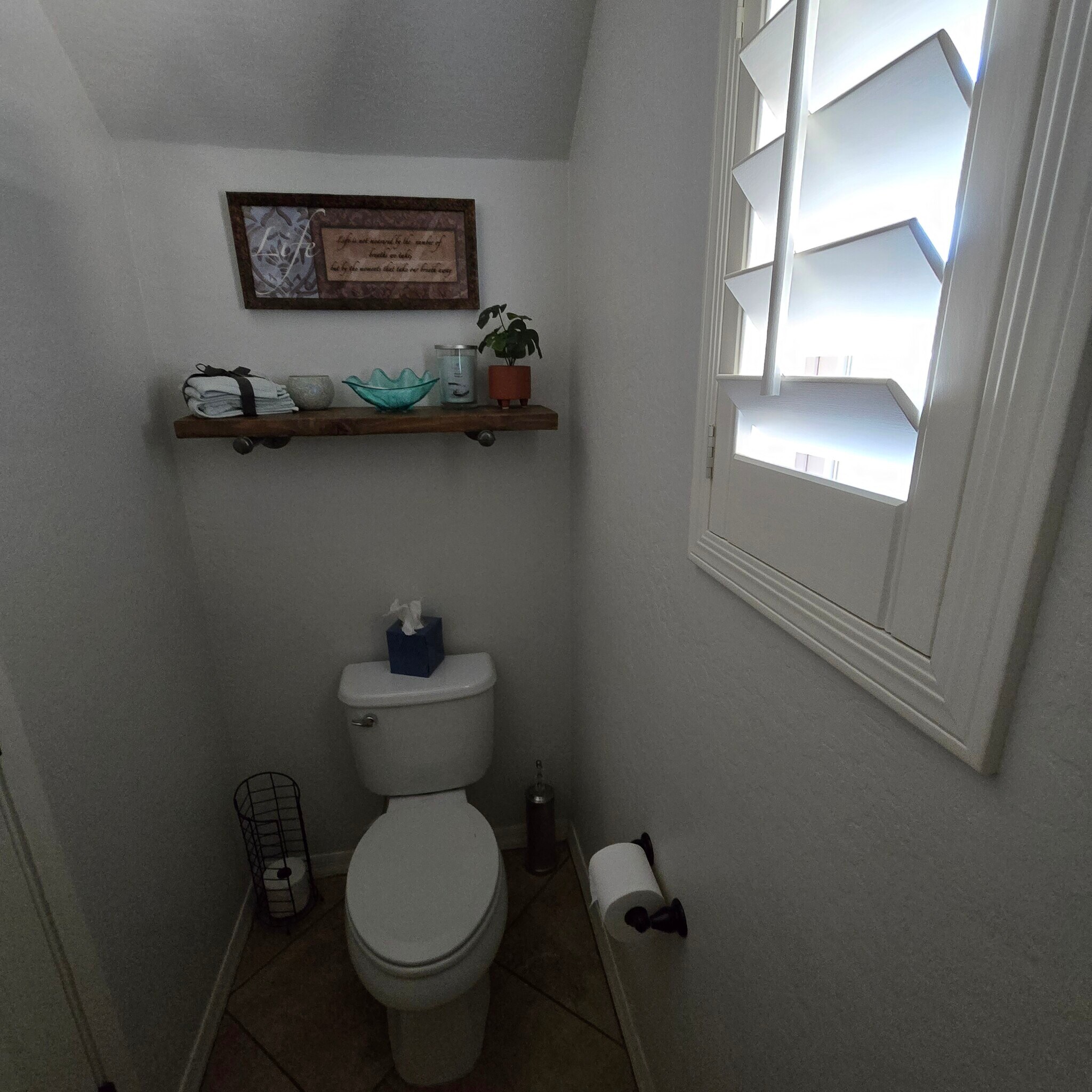 1/2 bathroom at entry and bottom of stairs - 280 E Indigo Dr