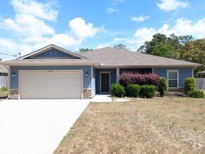 Building Photo - 8934 E River Dr
