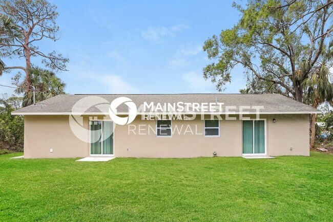 Building Photo - 3 Bedroom Pet-Friendly Home in PORT CHARLOTTE, FL with Main Street Renewal