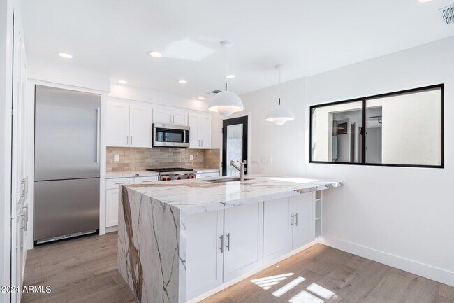 Building Photo - 7688 E Minnezona Ave