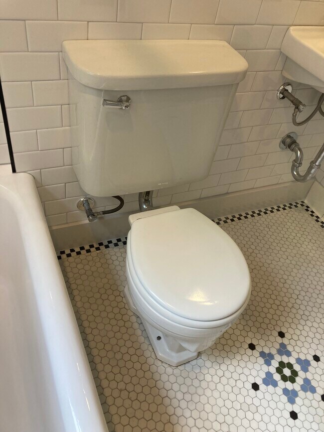 Toilet antique 2 piece - 903 E 2nd St