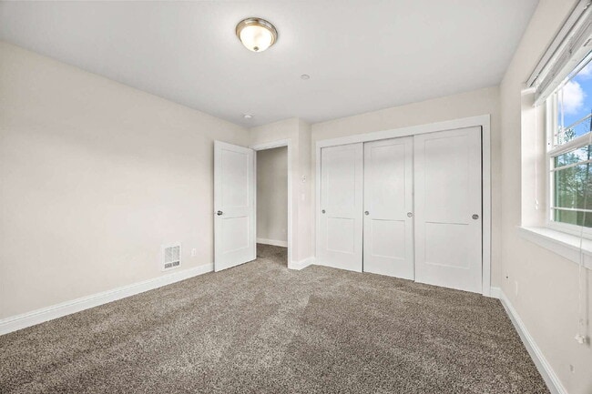 Building Photo - 4 bedrooms, 2.5 bathrooms with attached garage. This large unit is 3 floors!  Rent of $3295.00 in...