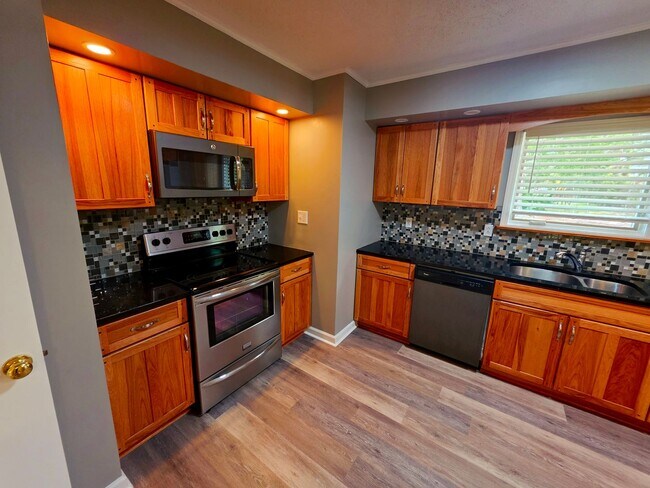 Building Photo - Nicely updated 3 bedroom, 2 bath home with 1-car garage