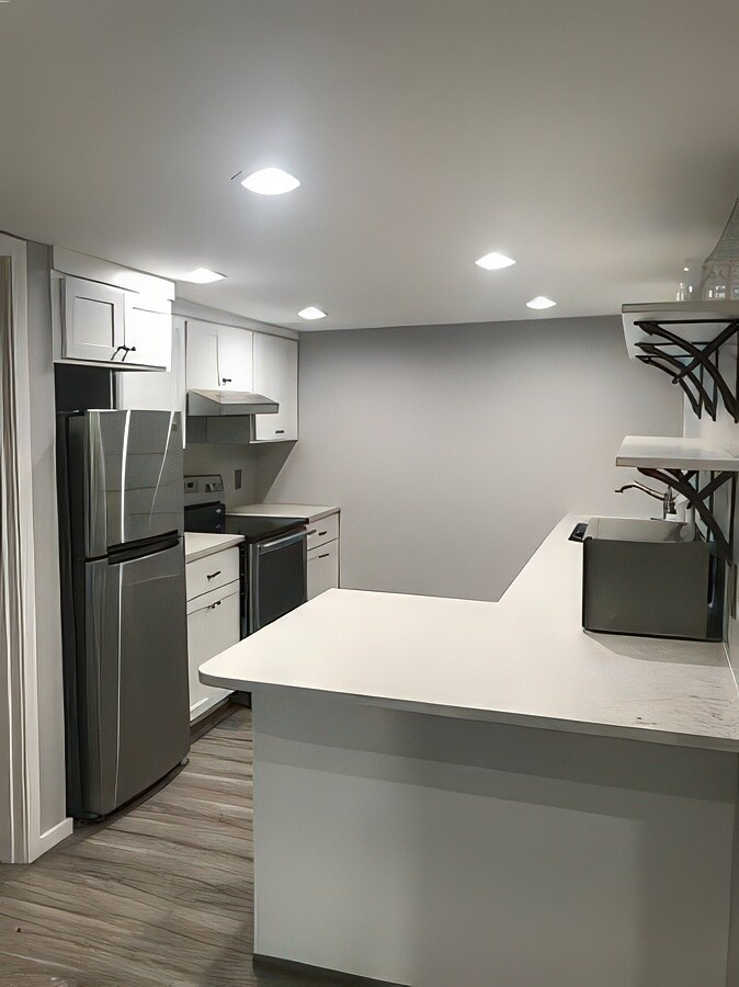 View into Kitchen from Living Room - 831 NE Holland St