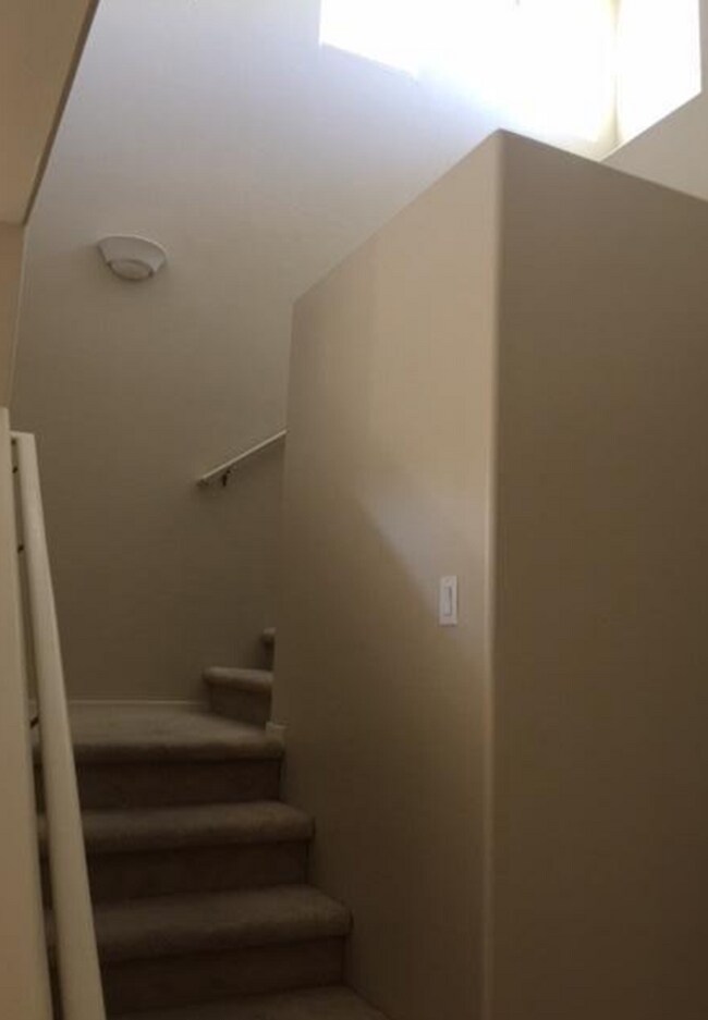 Building Photo - Adorable 2 story patio style with three spacious bedrooms and two full baths upstairs