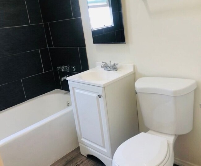 Building Photo - Studio includes all utilites, kitchen appl...