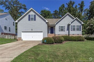 Building Photo - Beautiful 4-Bedroom Home with Spacious Bac...