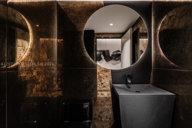 Building Photo - 5875 Collins Ave
