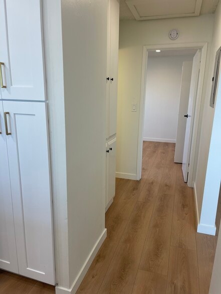 View from kitchen towards bedroom. Bathroom in-between the two. - 1039 6th St