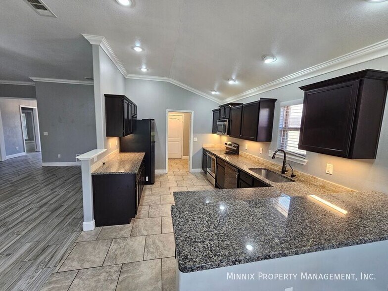 Building Photo - 6902 Ranch Hand Dr
