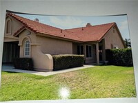 Building Photo - 7554 Plumaria Dr