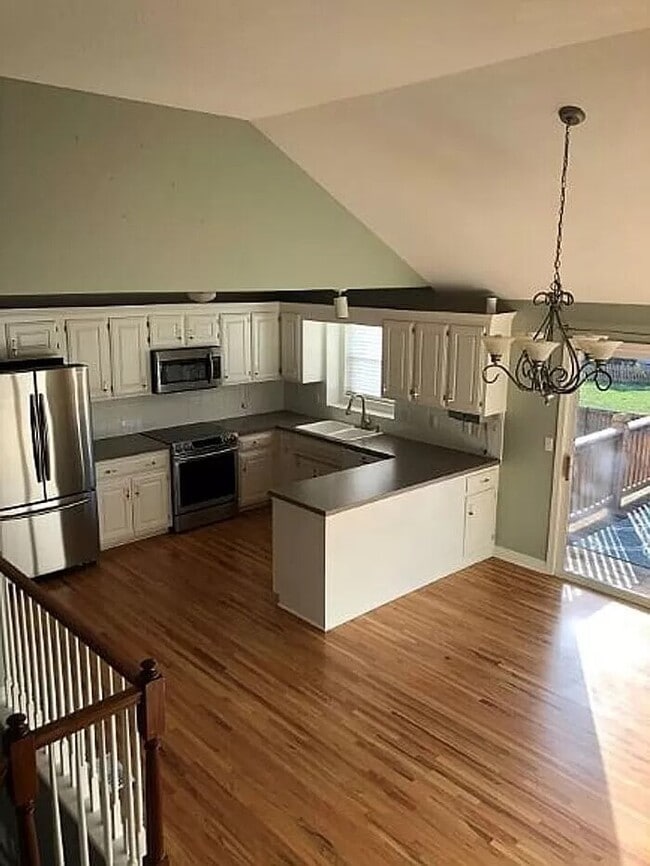 Building Photo - Spacious 4-Bedroom Greenwood Home with Vau...