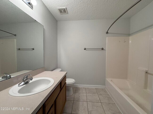 Building Photo - 6985 Ortega Woods Dr