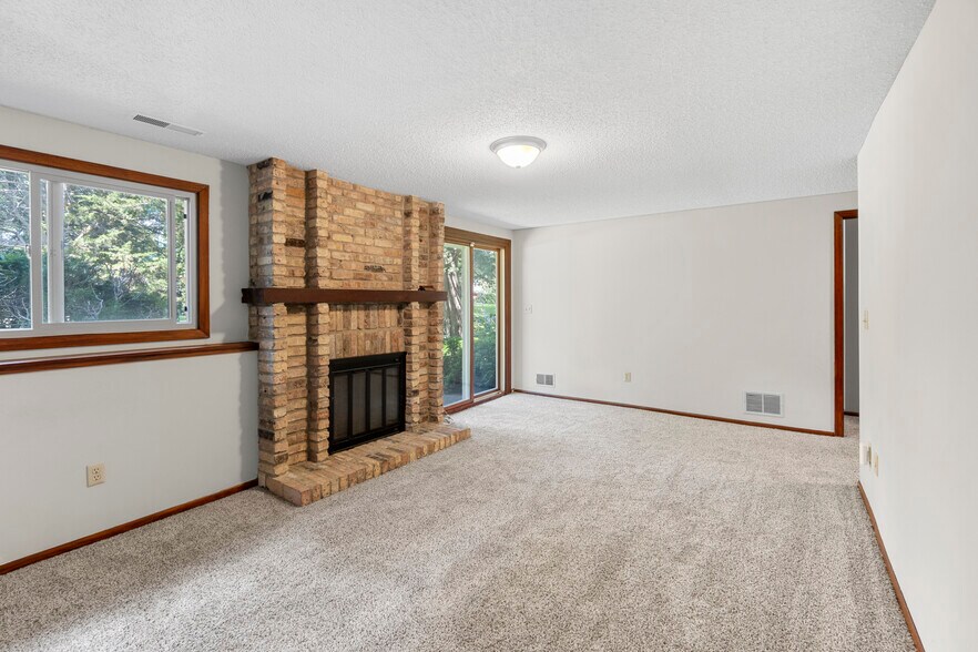 Lower-level walk-out basement, new carpet, paint and multi-functioning lights - 9774 Dorset Ln