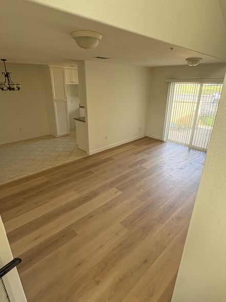 Downstairs living area and patio - 2946 S Campus Ave