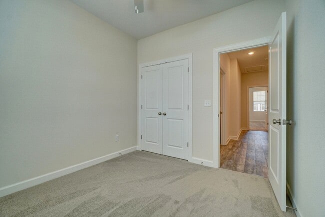 Building Photo - Available 08-05-25! Coastal Luxury Townhom...