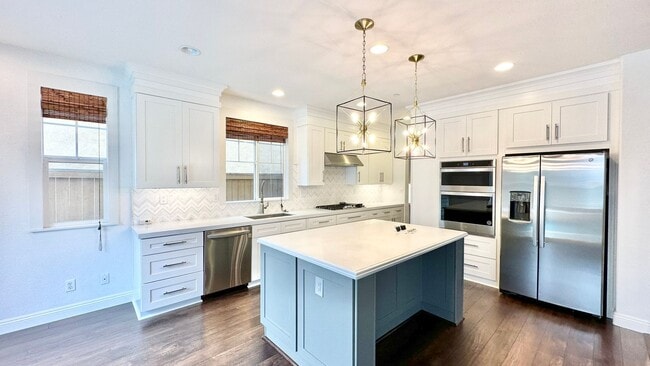 Building Photo - Beautifully Updated Two-Story Home in Lake Rancho Viejo Community, complete with Pool & Solar!