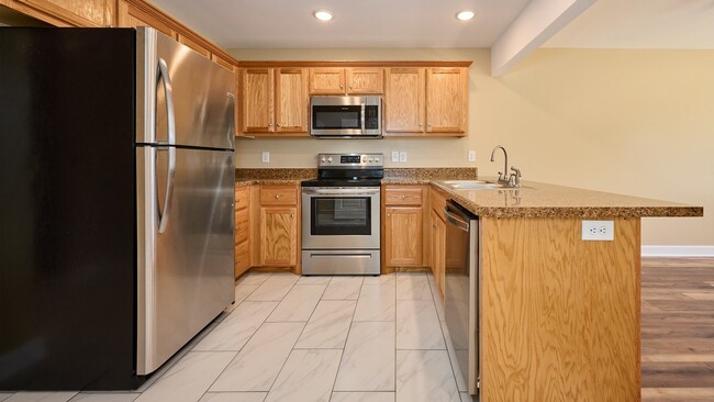 Building Photo - Now Showing: 2BR, 1 1/2BA townhome. (Do no...