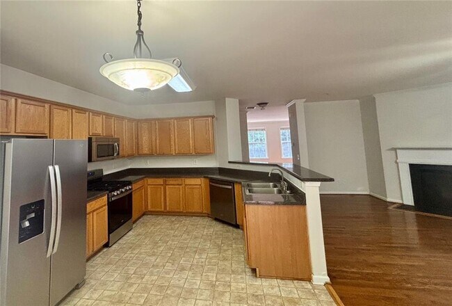 Building Photo - 4668 Creekside Villas Way