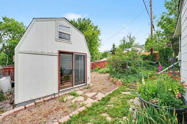 Building Photo - Charming Golden Retreat with a Backyard Oasis, Garden Dreams & Bonus Loft Office!