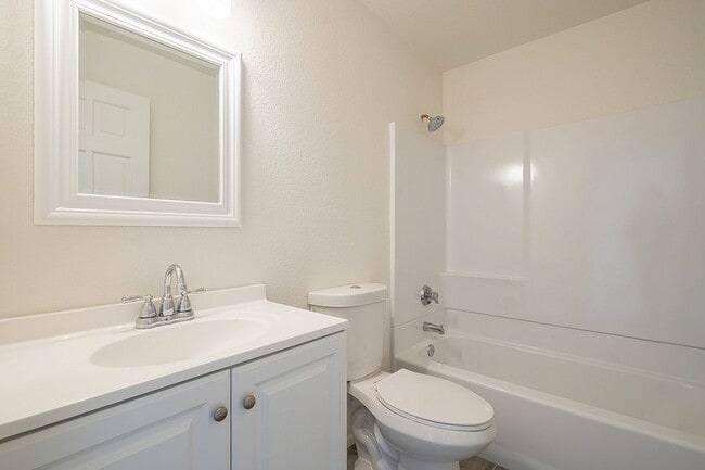 Building Photo - Updated home with large backyard & 2 car g...