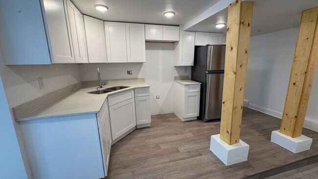 Building Photo - 7423-7429 Hampson - 7423 Basement Left