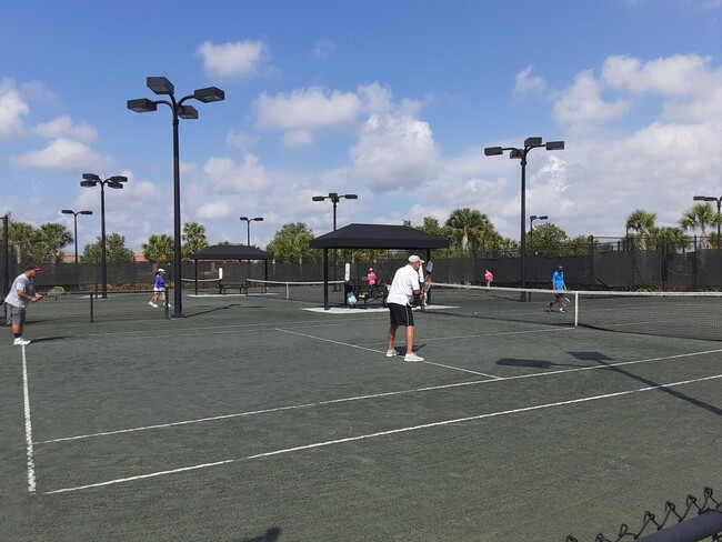 Building Photo - Seasonal/short term turnkey furnished Incredible 2/2 with den ground floor condo in resort Esplan...