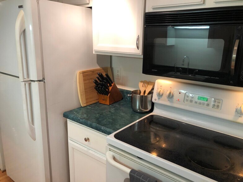 Full stack kitchen with all you need with full size fridge, stove, microwave, oven, pots and pans, a - 8200 E Jefferson Ave