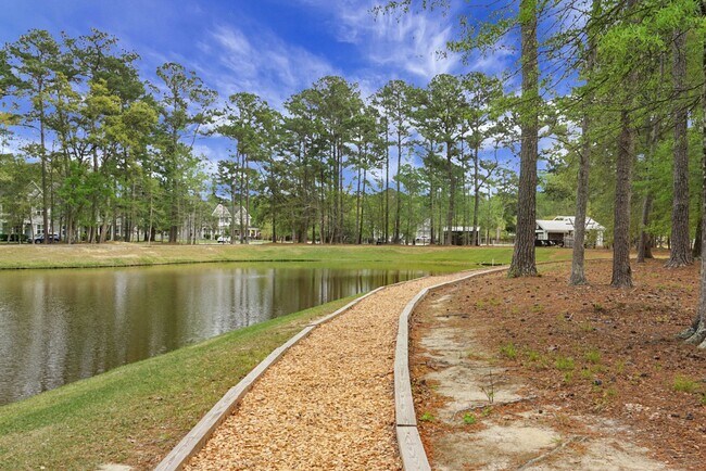 Building Photo - Johns Island 4BR, 2.5 BA Gem: Features Wood Floors, 2-Car Garage, & Community Pool