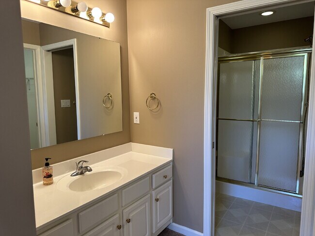 Building Photo - Well-Maintained Condo with 2 Bonus Rooms & Attached 2-Car Garage