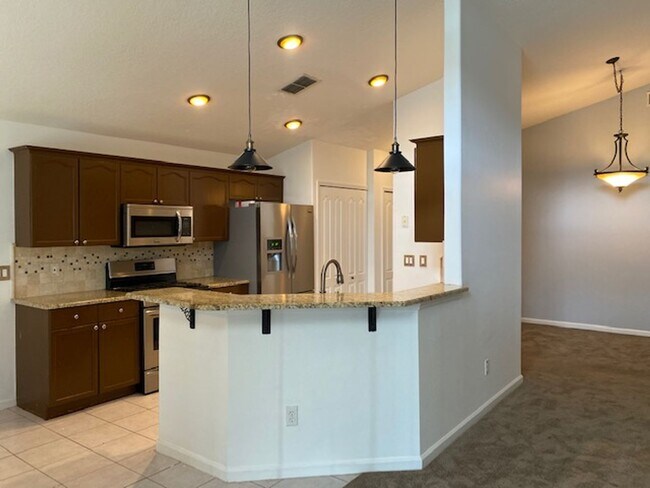 Building Photo - Lakefront 3-Bedroom Pool Home in Gated Com...