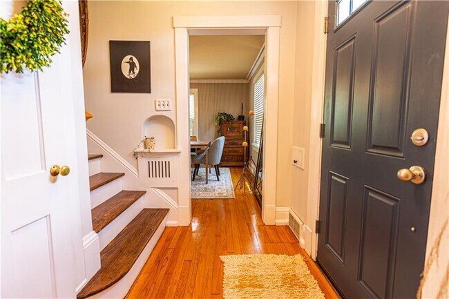 Building Photo - 1/2 Off First Month's Rent for Stunning 4-Bedroom Home with Attached Garage and Fenced Yard