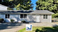 Building Photo - Cute and cozy, newly renovated 3 bedroom tucked inside a charming Tri-plex!