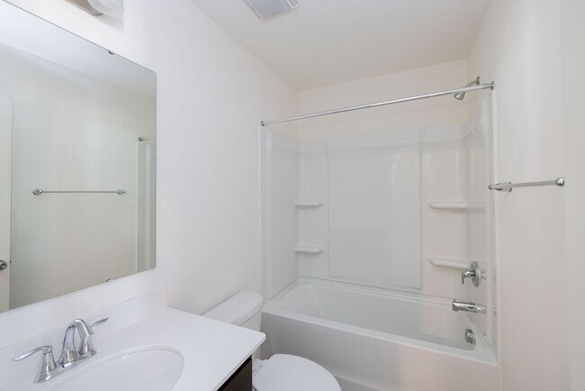 Building Photo - READY IN AUGUST 3 br 2.5 Townhome Near His...