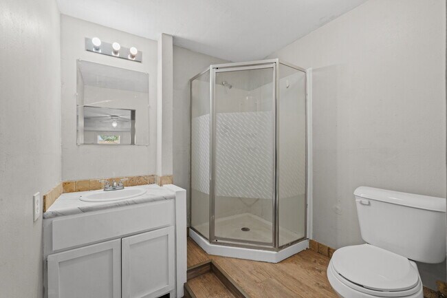Building Photo - Updated Home with Gorgeous Floors & Large Backyard