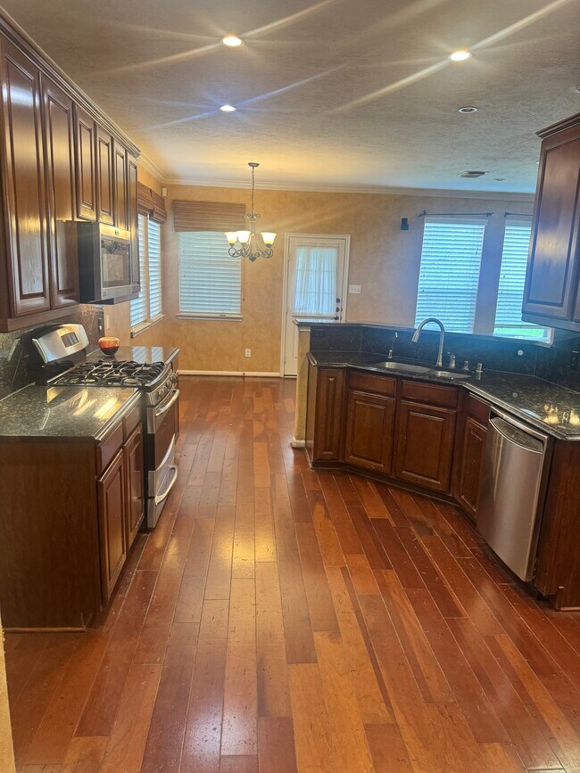 Building Photo - 11303 English Rose Trail