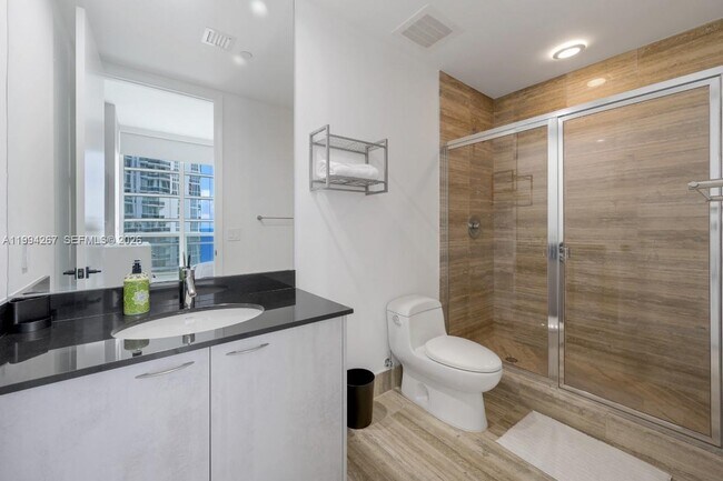 Building Photo - 15811 Collins Ave