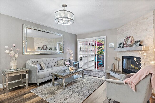 Building Photo - Two Bedroom/Two and a half bath gated townhome.