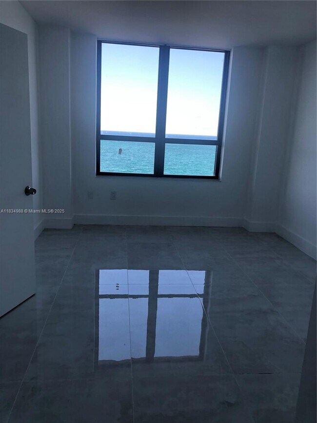 Building Photo - 10185 Collins Ave