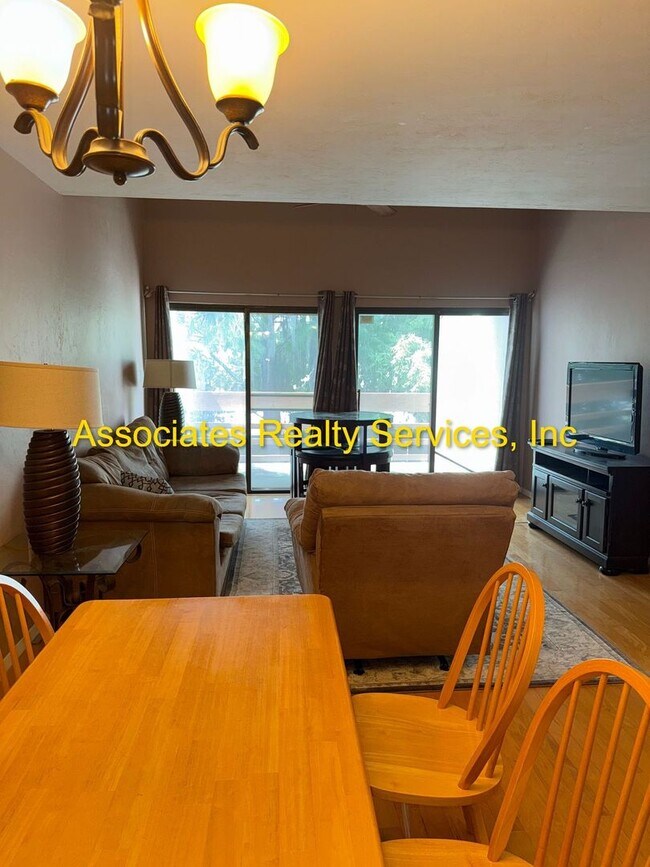 Building Photo - 2-Bedroom Condo with Dual Balconies and PO...