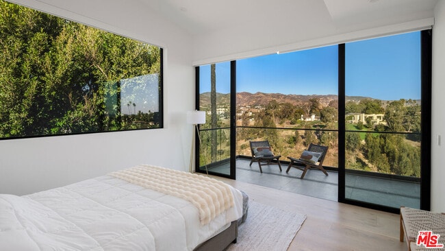Building Photo - 6656 Dume Dr