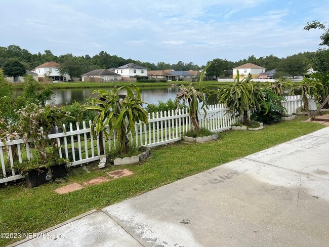 Building Photo - 6580 Gentle Oaks Dr N