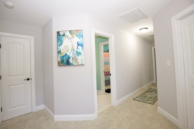 Building Photo - "Spacious 4-Bedroom Gem with 2.5 Baths at ...